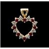 Image 1 : Blue Topaz, Garnet and Diamond Pendant - 14KT Yellow Gold