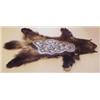 Image 1 : Alan Belcher (b. 1957) American, WOLVERINES, 1990, mixed media photograph adhered to a pelt, 49...