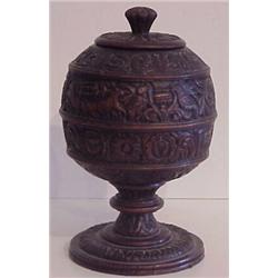 Decorative Arts: Round Box (19th Century), An ornately carved round wood box with lid and footb...