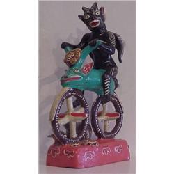 Mexican School (20th Century), CYCLIST, hand-painted ceramic figure, possibly from the Dias de...