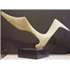 Image 1 : Leonardo Nierman (b. 1925) Israeli/Mexican, FLIGHT, white marble sculpture with black marble ba...