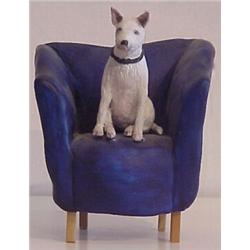 Nancy Rehg (20th Century) American, BLUE CHAIR WITH TERRIER, acrylic painted ceramic sculpture,...