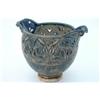 Image 1 : A large Martinware twin-handled bowl, the pierced body decorated with bands of flowers, the middl...