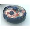 Image 1 : A Moorcroft pot and cover, of circular shape, the blue ground tube-lined with anemones, incised t...