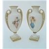 Image 1 : A pair of Minton twin-handled vases, the bisque bodies painted with scenes of nymphs in diaphanou...