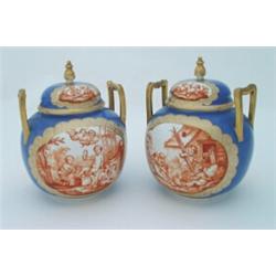 A pair of Augustus Rex porcelain jars and covers, of circular shape with high shoulder rectangula...