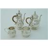 Image 1 : A four-piece Queen Anne style silver tea set, with cane handles, Sheffield 1904, 44 ozs gross, to...