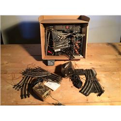 Pile of O Gauge Track and Transformers (3)