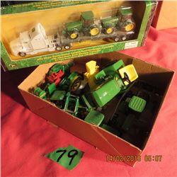 Box of miniature tractors and 1/87 scale semi