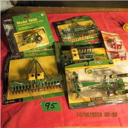 7 John Deere pull type implements