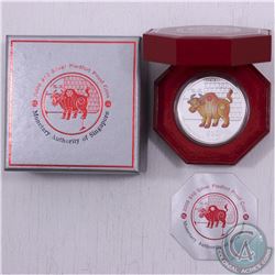 Singapore Mint: 2009 Singapore $10 2oz .999 Fine Silver Proof Year of the Ox Coloured Coin. The weig