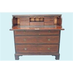 A George IV mahogany secretaire chest, rosewood cross-banded and boxwood line-inlaid, having moul...