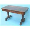 Image 1 : An early Victorian rosewood library table, having carved frieze fitted two drawers on tapered oct...