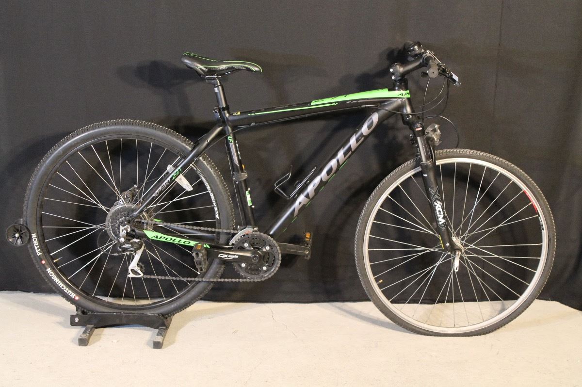 GREEN AND BLACK APOLLO 29T 24 SPEED FRONT SUSPENSION MOUNTAIN BIKE WITH ...