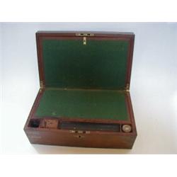 A MAHOGANY AND BRASS BOUND WRITING SLOPE, 19th Century, frieze drawer, baize lined fitted interio...