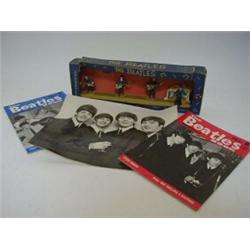 A COLLECTION OF BEATLES MEMORABILIA, including boxed Subuteo models of The Band, (plus another se...