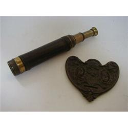 A BRASS TELESCOPE, four barrels, leather covered, (lacking lens cap) full length 60cm and a 1910...