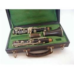 A CASED CLARINET, signed 'Amati', blackwood and early synthetic  20-30...