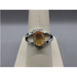 Citrine Ring set with 2 Diamonds in open-work band