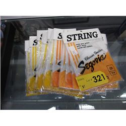 16 Packages of new guitar strings