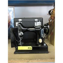 Small vintage portable Singer sewing machine