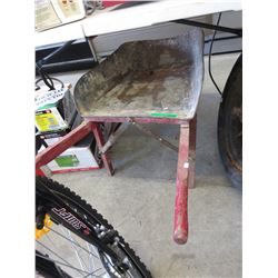 Vintage wheel barrow with wood frame