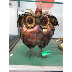 Metal owl sculpture