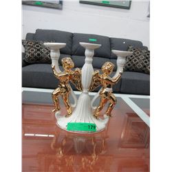 Porcelain candelabra with cherubs