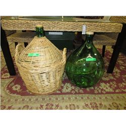 2 Glass demijohns - 1 with wicker basket
