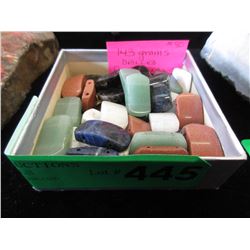 143 Grams of polished stone pastilles