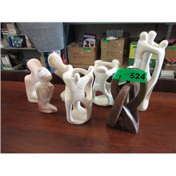 7 Carved stone figurines