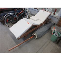 Teak patio lounge with patio umbrella