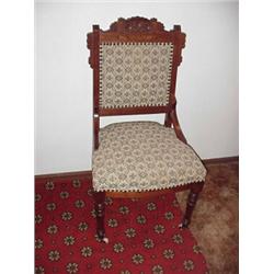 Eastlake Victorian Parlor Chair, nice covering, caster on front legs.