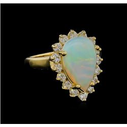 1.00ct Opal and Diamond Ring - 14KT Yellow Gold