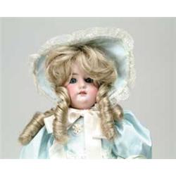 THREE OPEN-MOUTHED GERMAN DOLLS