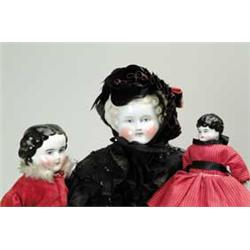 GROUP OF THREE CHINA HEAD DOLLS