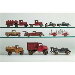 LOT OF 10 SMALL C.I. TRUCKS