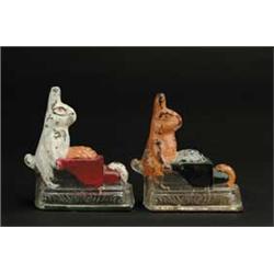 2 RABBITS WITH WHEELBARROW CANDY CONTAINERS