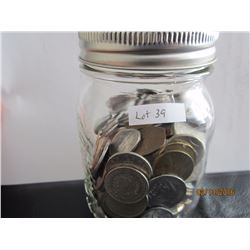 A jar of foreign coins