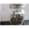 Image 1 : A jar of foreign coins