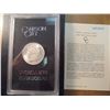 Image 1 : 1884 -CC GSA MORGAN SILVER DOLLAR (UNC) WITH ORIGINAL US MINT PACKAGING AND CERTIFICATE.