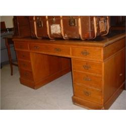 LARGE OAK DOUBLE PEDESTAL DESK WITH LEATHER TOP Estimate: £200-400...