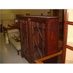MAHOGANY DOUBLE DOOR SHELVED BOOKCASE Estimate: £200-300...
