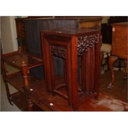 MAHOGANY ORIENTAL STYLE NEST OF 4 TEA TABLES Estimate: £50-100...