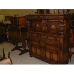 OAK COAT CUPBOARD WITH MATCHING PULL OUT TABLE Estimate: £400-600...