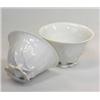 Image 1 : A pair of Chinese blanc de Chine wine cups, the leaf and butterfly moulded sides tapering to four l.