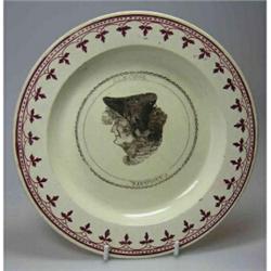 A late 18th century Turner's creamware plate printed in black centrally with reversible heads of the