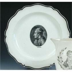 An 18th century creamware plate centrally printed in black with an oval portrait of 'Necker' within.