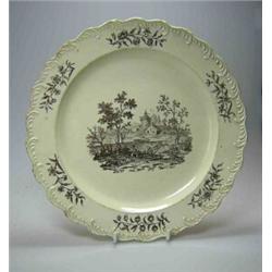 An 18th century Wedgwood creamware plate printed by Sadler and Green in black with central herdsman.