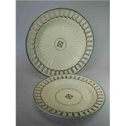 An early 19th century Shorthose creamware plate and another similar, each with arcaded rim outside..